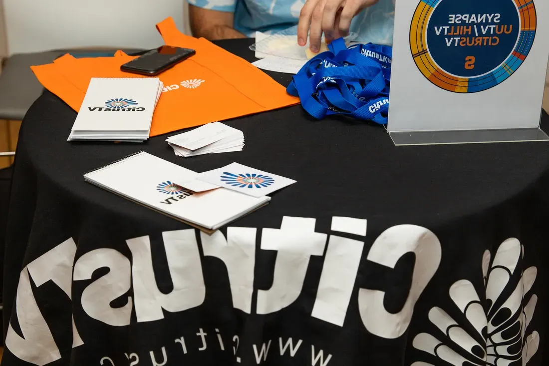 The table with information for Citrus TV at an organization fair.